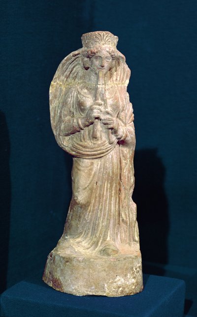 Estatuilla de una mujer tocando una flauta doble, de Túnez de Punic